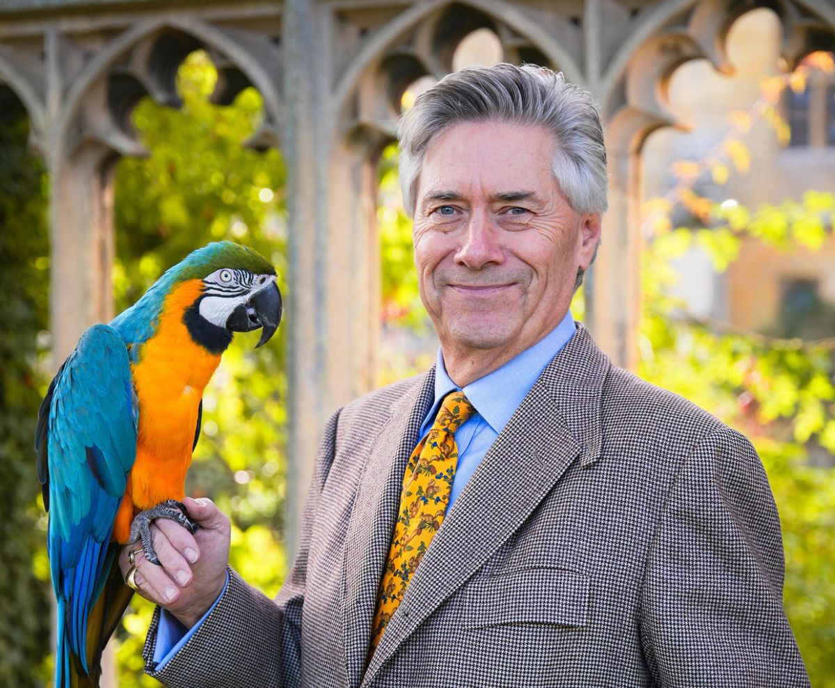 Nicholas Granger with Bella the macaw